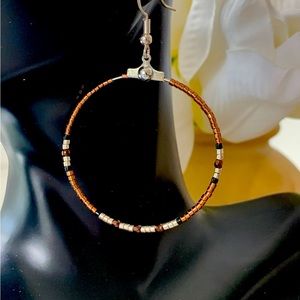 Handmade Beaded Hoop Earrings in Brown with White and Black Accents